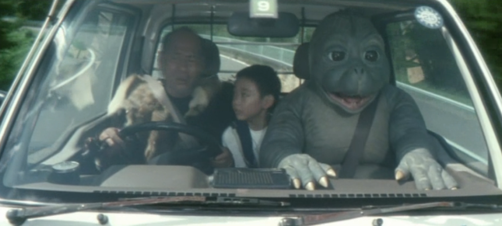 Godzilla_Final_Wars_-_4-3_Minilla_in_the_Passanger_Seat